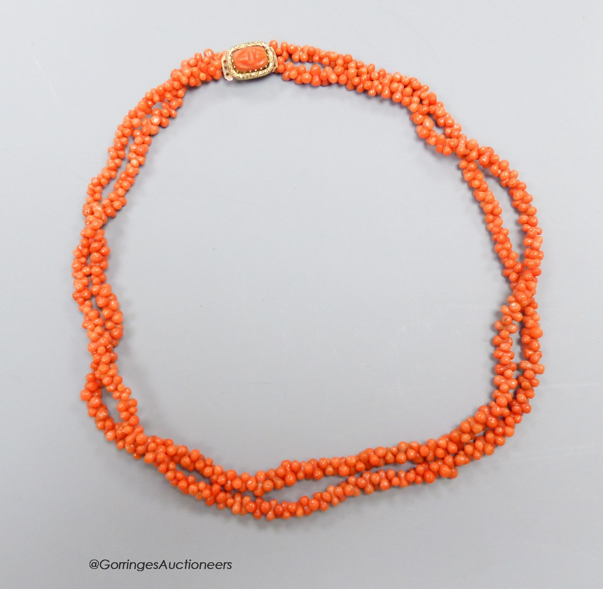A 19th century coral bead long necklace, with Georgian yellow metal clasp, 92cm.